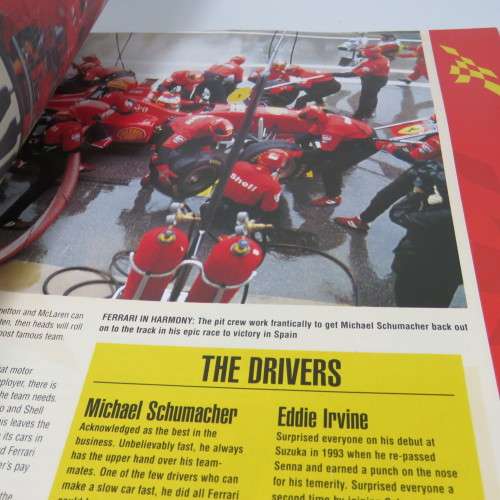 The Official Formula One 1997 Grand Prix Guide - including newspaper with article