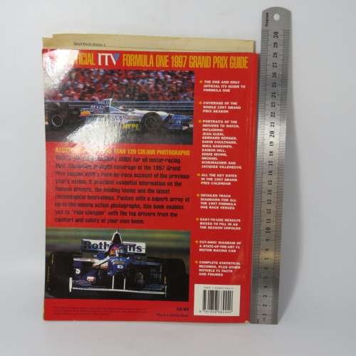 The Official Formula One 1997 Grand Prix Guide - including newspaper with article