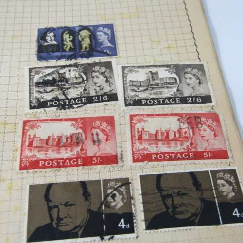 Old stamp album with over 300 stamps - some loose