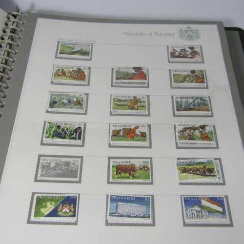Transkei Slide-in pre printed stamp album with first lot of mint stamps