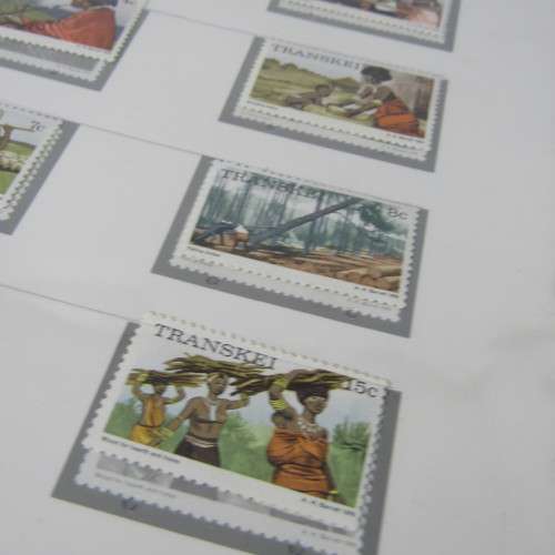 Transkei Slide-in pre printed stamp album with first lot of mint stamps