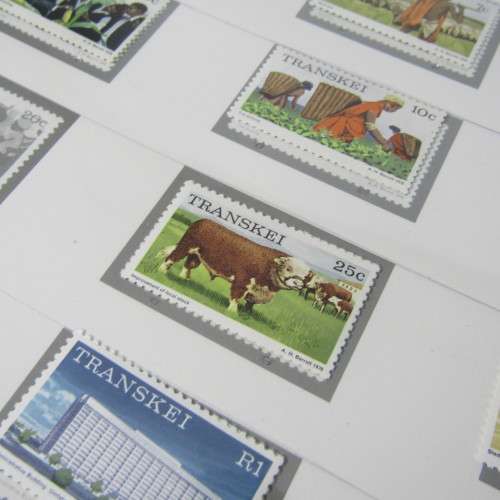 Transkei Slide-in pre printed stamp album with first lot of mint stamps