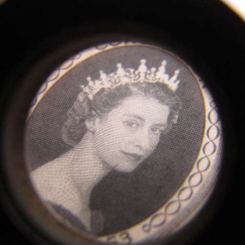 Kenya Uganda and Tanganyika Full page of 20 cents coronation of Queen Elizabeth with faults