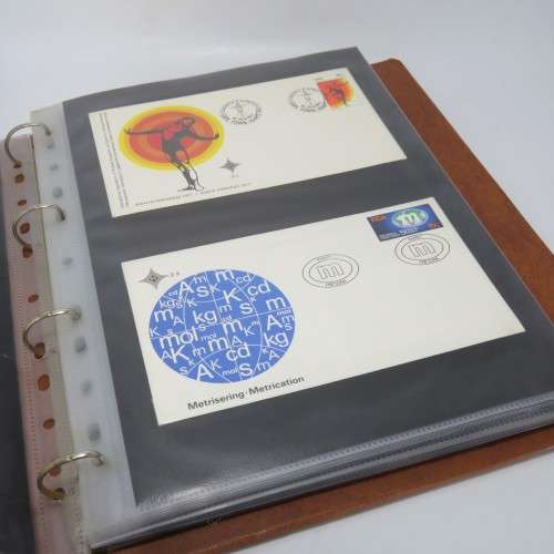 Loose leaf album with more than 40 First day covers from South Africa and other items