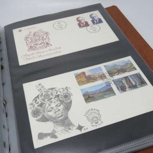 Loose leaf album with more than 40 First day covers from South Africa and other items