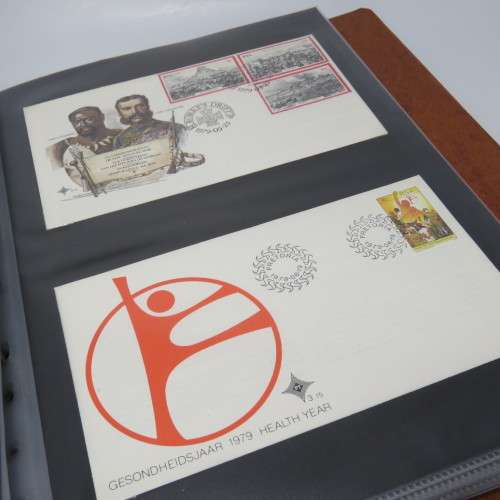 Loose leaf album with more than 40 First day covers from South Africa and other items