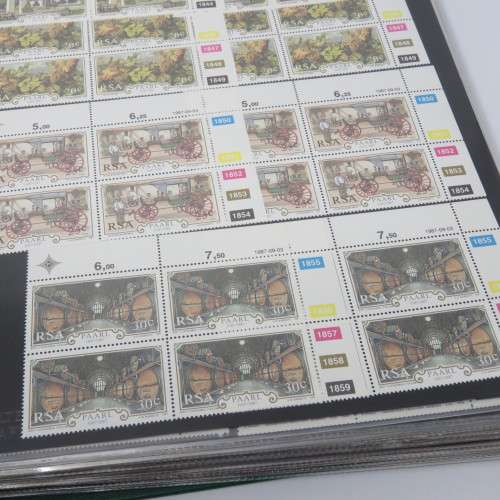 Loose leaf stamp file with over 320 South Africa control block or strips