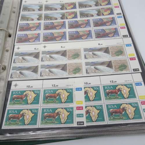 Loose leaf stamp file with over 320 South Africa control block or strips