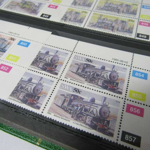 Decent 32 page stamp album with South West Africa control blocks, sheets and stamps