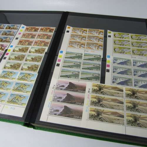 Decent 32 page stamp album with South West Africa control blocks, sheets and stamps