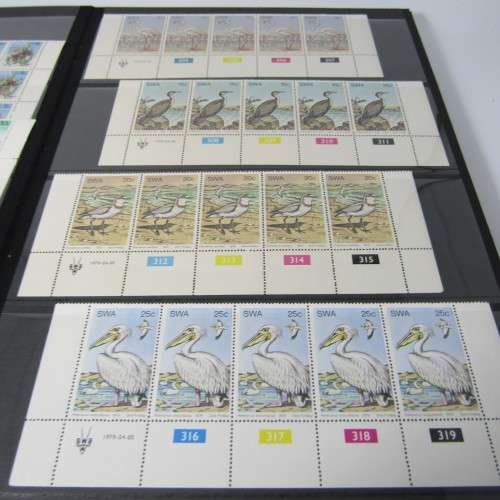 Decent 32 page stamp album with South West Africa control blocks, sheets and stamps