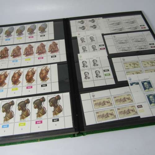 Decent 32 page stamp album with South West Africa control blocks, sheets and stamps