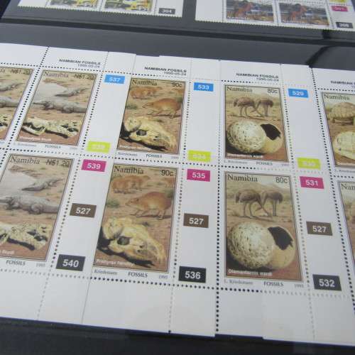 Stamp album with South West Africa S1 control blocks including 3rd decimal series