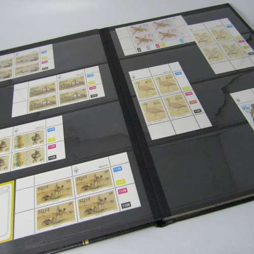 Stamp album with South West Africa S1 control blocks including 3rd decimal series