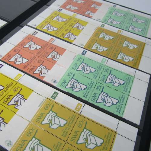 Stamp album with South West Africa S1 control blocks including 3rd decimal series