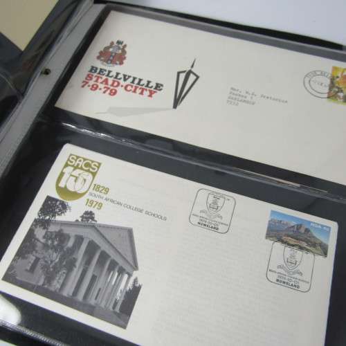 Lot of First Day Covers and other items in album with 38 pages - over 74 pages