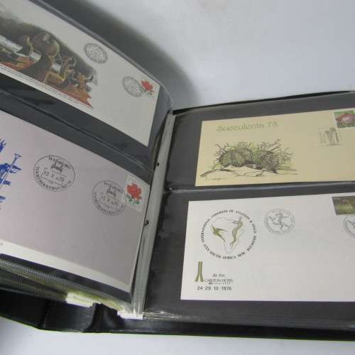 Lot of First Day Covers and other items in album with 38 pages - over 74 pages