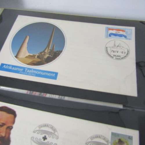 Lot of First Day Covers and other items in album with 38 pages - over 74 pages