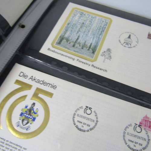 Lot of First Day Covers and other items in album with 38 pages - over 74 pages