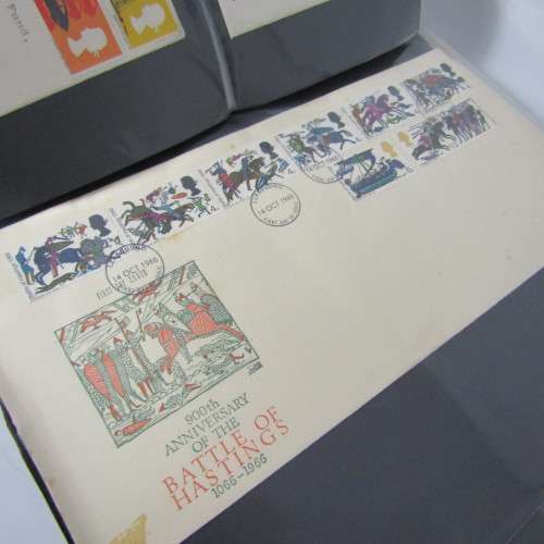 First Day Cover album with 85 old Great Britain First Day Covers - a few with rust spots