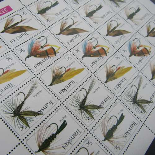 Stamp album with Transkei mint stamp collection with many control blocks and full sheets