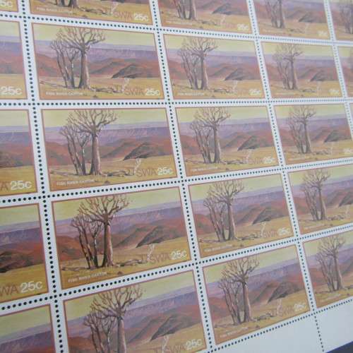 Loose leaf album with South West Africa full sheets of stamps at portion of book value - rarely seen