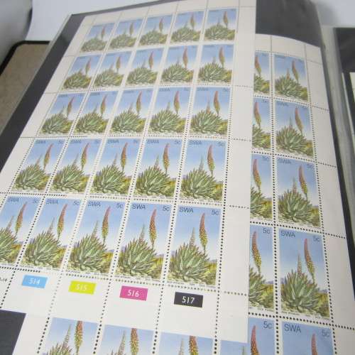 Loose leaf album with South West Africa full sheets of stamps at portion of book value - rarely seen