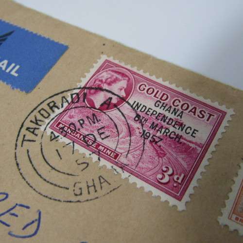 Postal cover posted from Takoradi, Ghana to Manchester, England with 2 gold Gold Coast stamps - genu