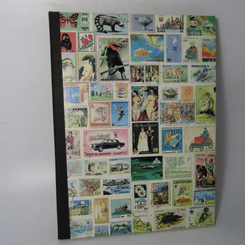 12 Page stamp album with over 500 world stamps