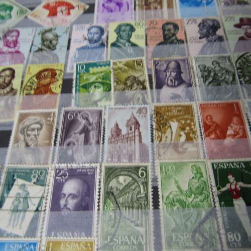 12 Page stamp album with over 500 world stamps