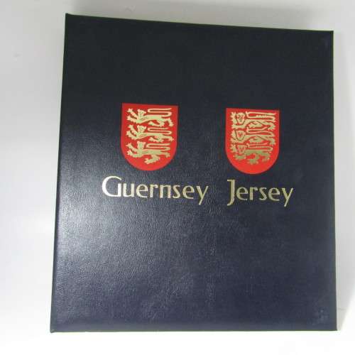 Guernsey and Jersey stamp album with hundreds of old stamps