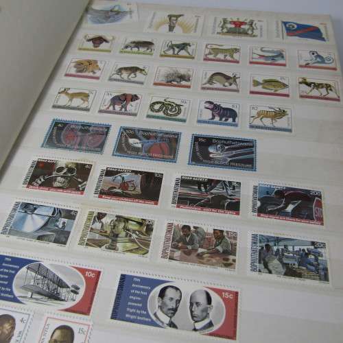 48 Page stamp album with mostly stamps from Bophuthatswana, Ciskei, Transkei, Venda