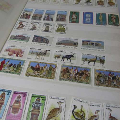 48 Page stamp album with mostly stamps from Bophuthatswana, Ciskei, Transkei, Venda
