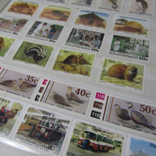 48 Page stamp album with mostly stamps from Bophuthatswana, Ciskei, Transkei, Venda