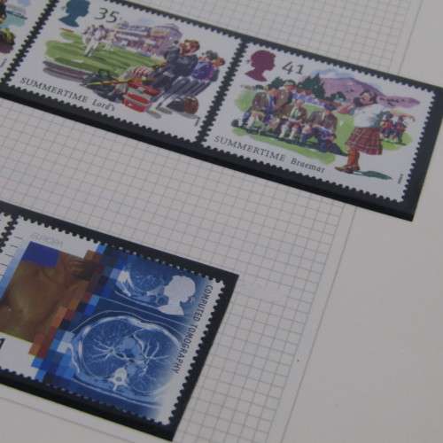 Great Britain mint stamp album from late 60`s onwards with hundreds of mint stamps