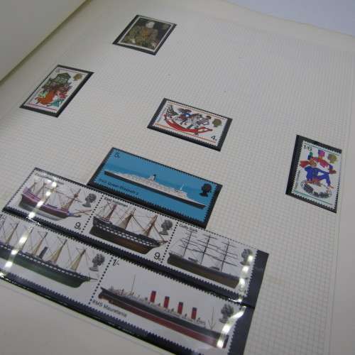 Great Britain mint stamp album from late 60`s onwards with hundreds of mint stamps