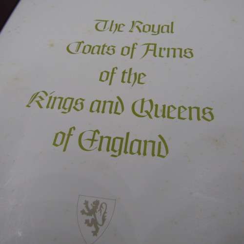 The Royal coats of arms of the Kings and Queens of England 22kt Gold stamps in ledger