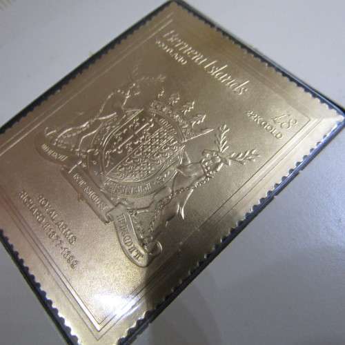 The Royal coats of arms of the Kings and Queens of England 22kt Gold stamps in ledger