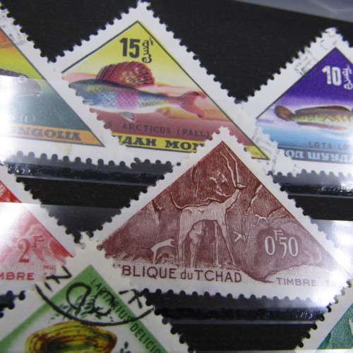 Lot of 12 Triangular stamps