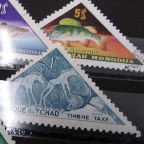 Lot of 12 Triangular stamps