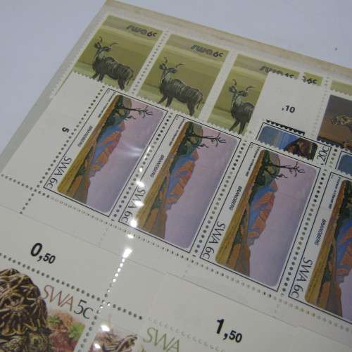 South West Africa Lot of 3 folders with about 100 SWA mint stamps