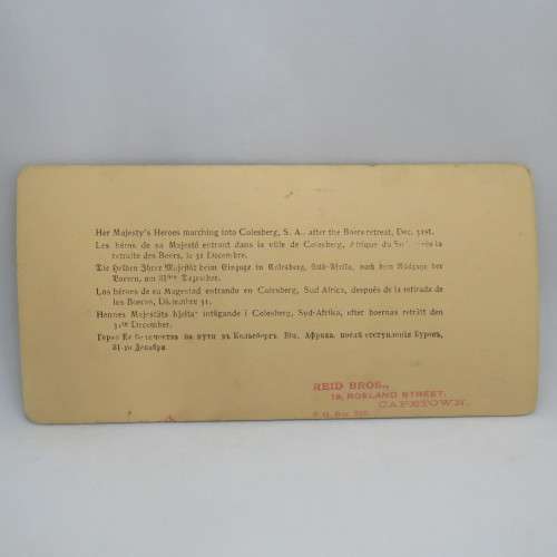 Boer War stereoscope card #25 - Her Majesty`s Heroes marching into Colesberg after the Boers retreat