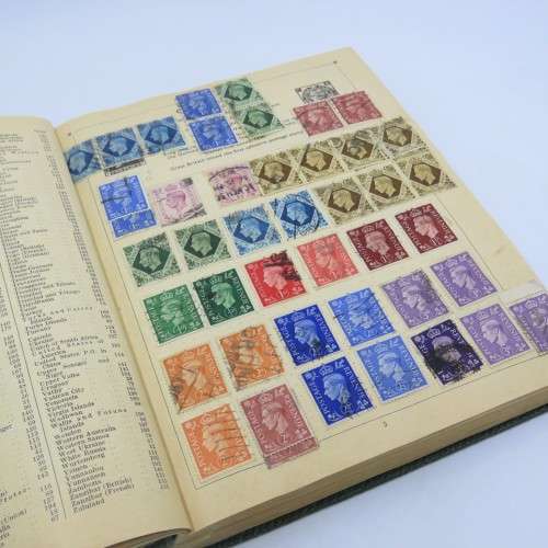 Postal stamp album of the world with over 1300 old stamps - Given to `Alice` in 1937