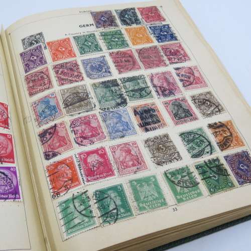 Postal stamp album of the world with over 1300 old stamps - Given to `Alice` in 1937