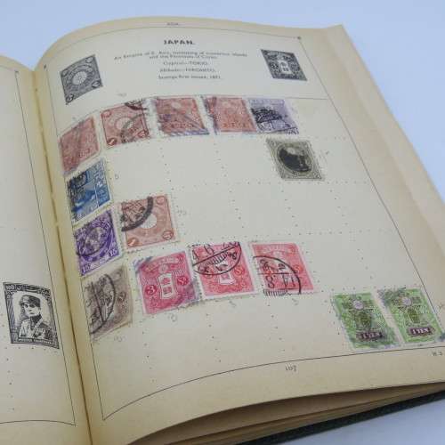 Postal stamp album of the world with over 1300 old stamps - Given to `Alice` in 1937