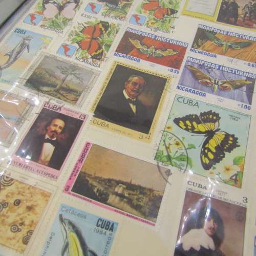Thematic stamp collection with about 400 stamps - glued to paper