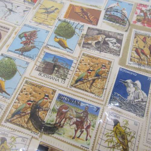 Thematic stamp collection with about 400 stamps - glued to paper