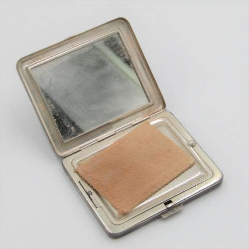 Sterling Silver powder puff with powder