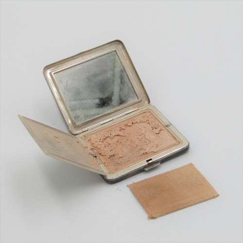 Sterling Silver powder puff with powder