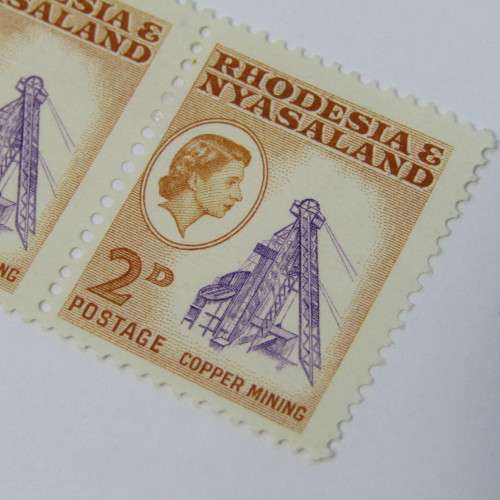 Block of 2 Rhodesia and Nyasaland SACC 20 mint stamps - hinged